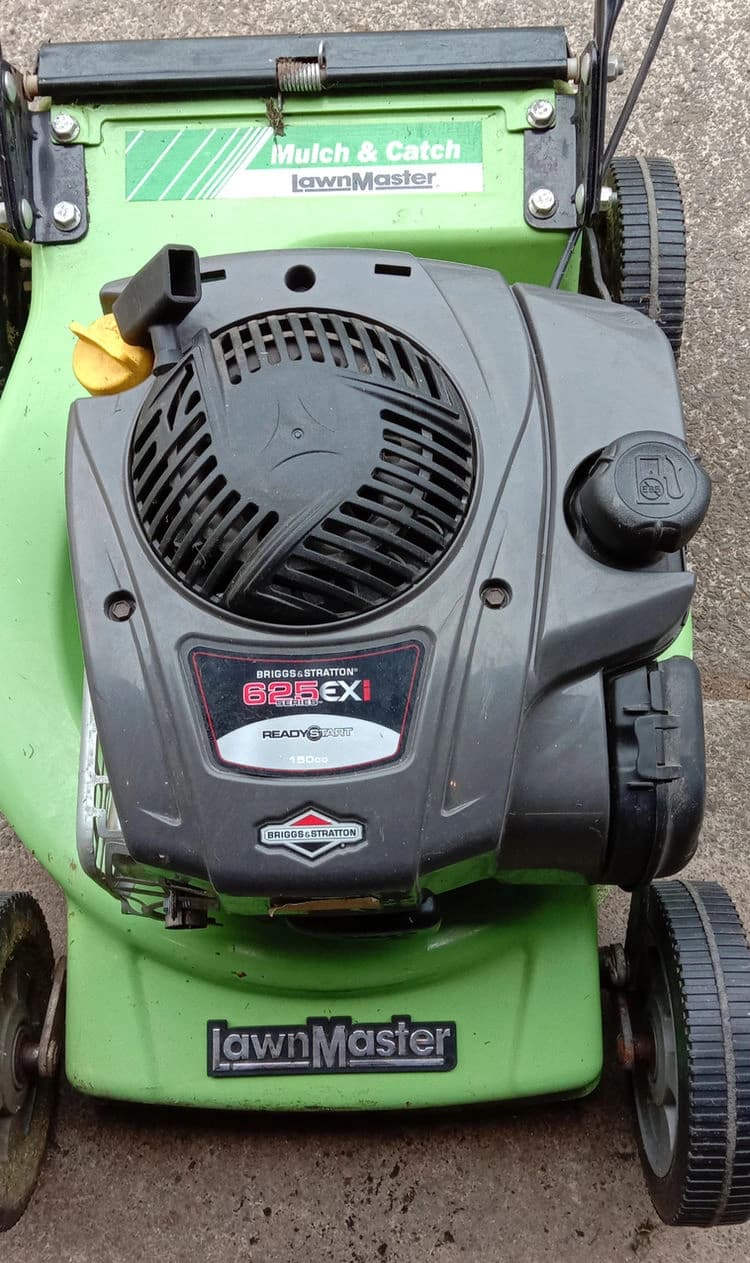 Green Lawnmaster lawnmower with a Briggs & Stratton engine, from above